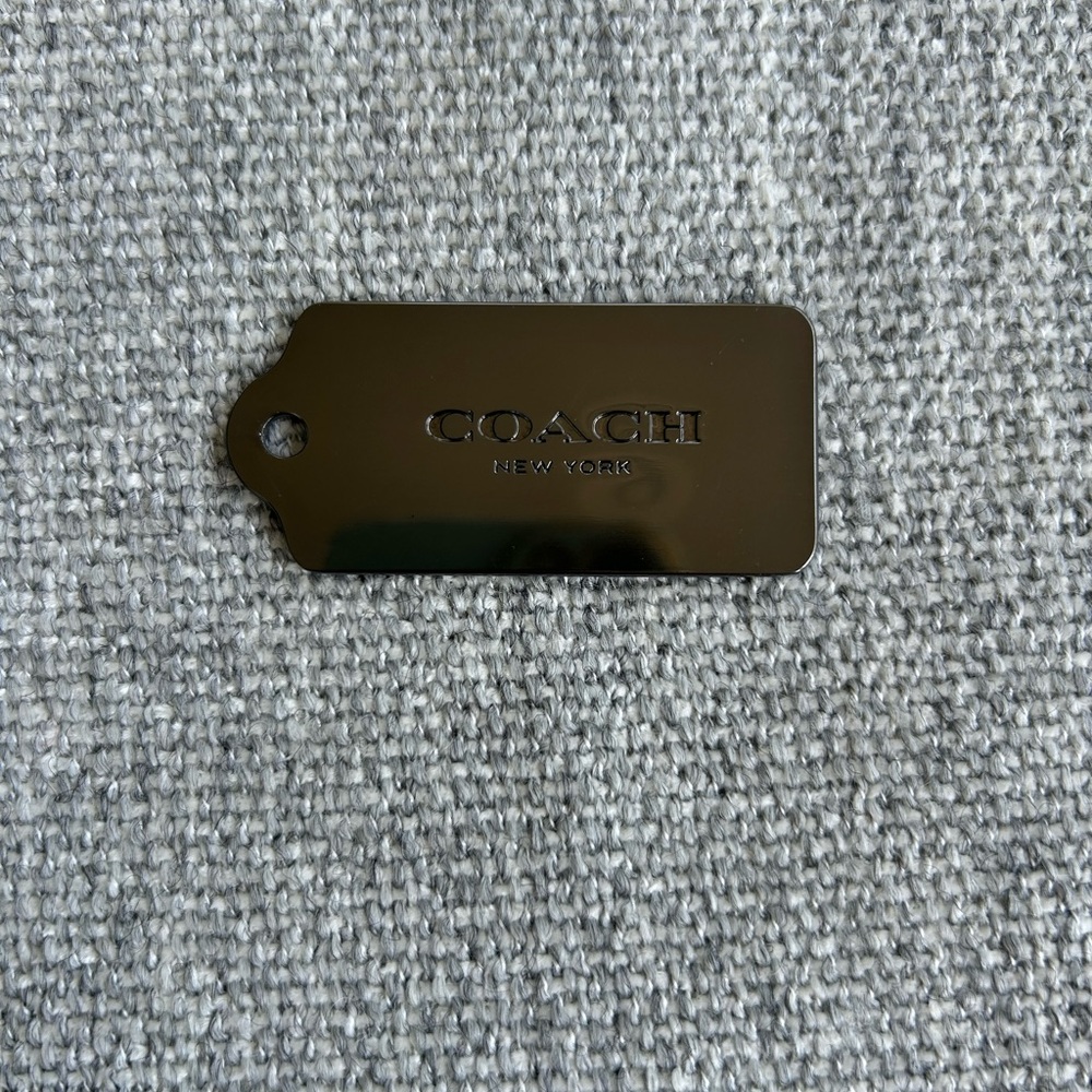 Coach gunmetal tag